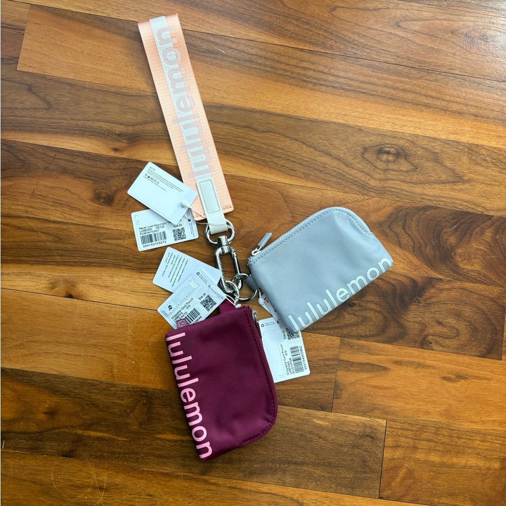 lululemon wristlet dual keyring in light gray & burgundy pouch Larger size, NEW